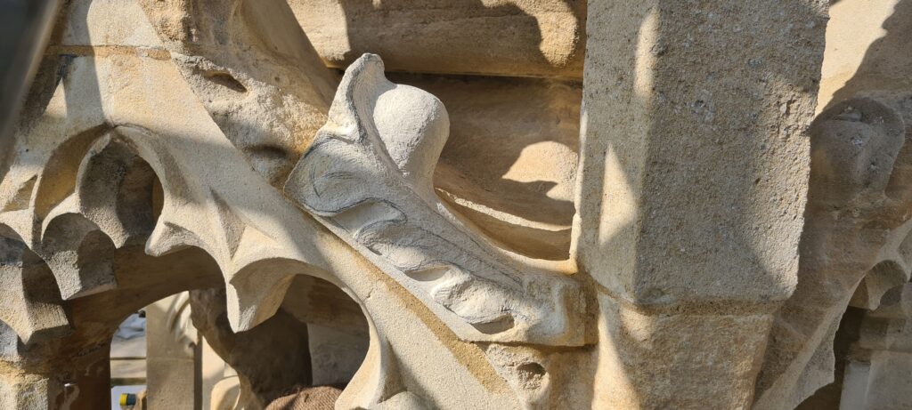 New stonework being carefully worked to fit perfectly into decayed areas of the Grade II* listed structure.