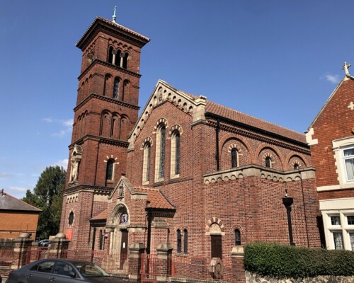 Sacred Heart Catholic Church in Aston, Birmingham. Photograph showing a brick building with tower: Sacred Heart Catholic Church in Aston, Birmingham.