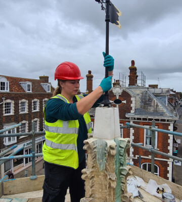 Reinstallation of conserved weather vane to Leighton Buzzard Market Cross Reinstallation of conserved weather vane to Leighton Buzzard Market Cross