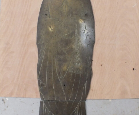 Monumental brass from Great Bromley church, Essex, before conservation