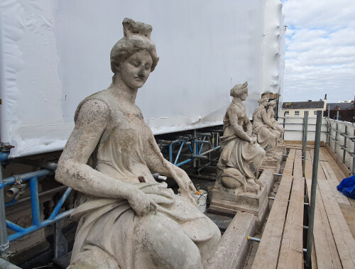 Sculptures atop Ipswich Post Office, during cleaning. Sculptures atop Ipswich Post Office, during cleaning.