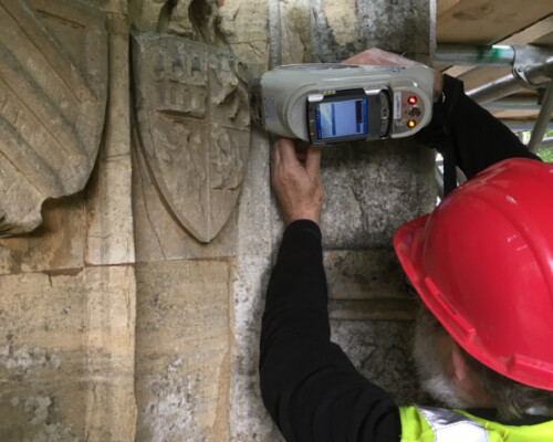 Using a hand-held XRF to to look for traces of paint at Northampton's Eleanor Cross, 2019. Using a hand-held XRF to to look for traces of paint at Northampton's Eleanor Cross, 2019.